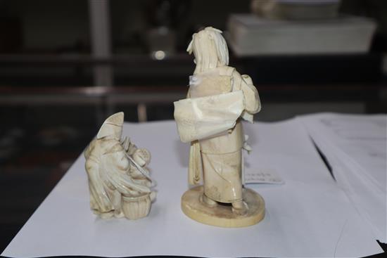 A Meiji carved ivory group of two children (damaged) on hardwood stand and a smaller group tallest 14cm incl. stand